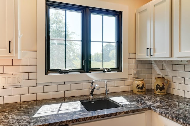 9730 Lancaster Kirkersville Rd NW, Baltimore, OH 43105 - kitchen featuring tasteful backsplash, a sink, white cabinets, and dark stone countertops