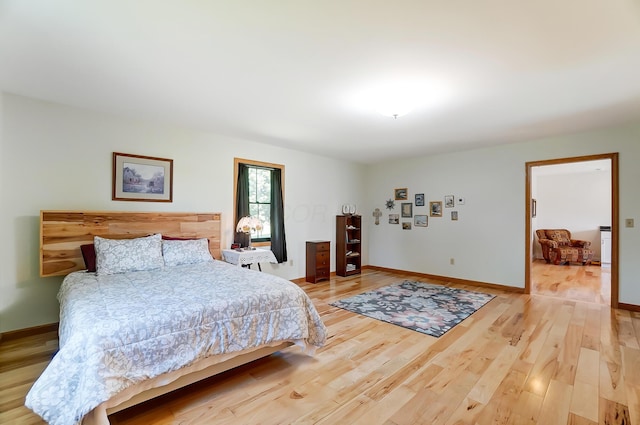 9730 Lancaster Kirkersville Rd NW, Baltimore, OH 43105 - bedroom featuring baseboards and wood finished floors