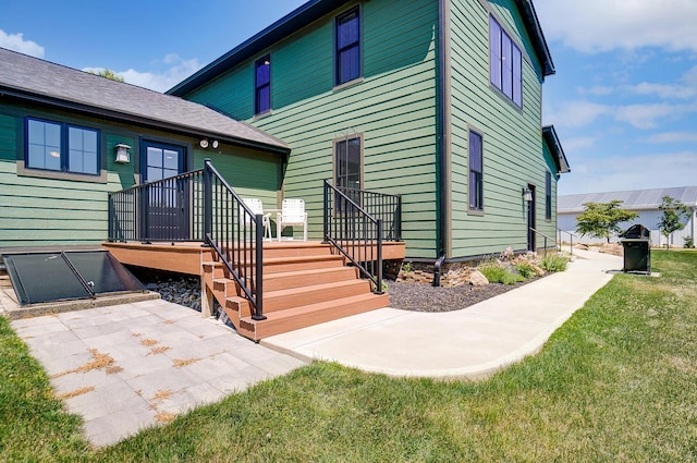 9730 Lancaster Kirkersville Rd NW, Baltimore, OH 43105 - rear view of house featuring a patio area and a lawn