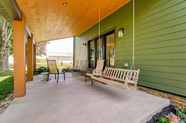 9730 Lancaster Kirkersville Rd NW, Baltimore, OH 43105 - view of patio featuring covered porch