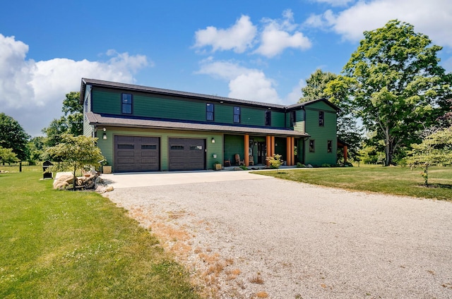 9730 Lancaster Kirkersville Rd NW, Baltimore, OH 43105 - view of front of home featuring a front lawn, driveway, and a garage
