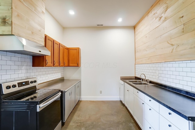 9730 Lancaster Kirkersville Rd NW, Baltimore, OH 43105 - kitchen with a sink, dark countertops, backsplash, concrete floors, and stainless steel range with electric stovetop