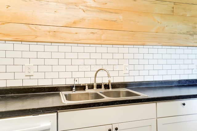 9730 Lancaster Kirkersville Rd NW, Baltimore, OH 43105 - kitchen featuring dark countertops, white cabinetry, tasteful backsplash, and a sink