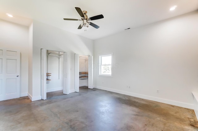 9730 Lancaster Kirkersville Rd NW, Baltimore, OH 43105 - unfurnished bedroom featuring concrete flooring, visible vents, multiple closets, and baseboards