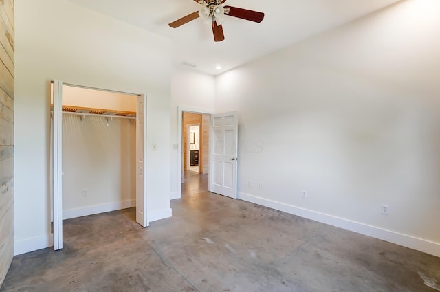9730 Lancaster Kirkersville Rd NW, Baltimore, OH 43105 - unfurnished bedroom with visible vents, baseboards, concrete flooring, and a towering ceiling