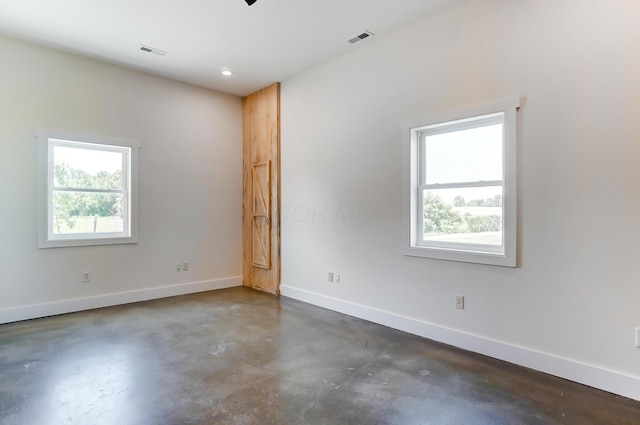 9730 Lancaster Kirkersville Rd NW, Baltimore, OH 43105 - unfurnished room featuring concrete floors, visible vents, and baseboards