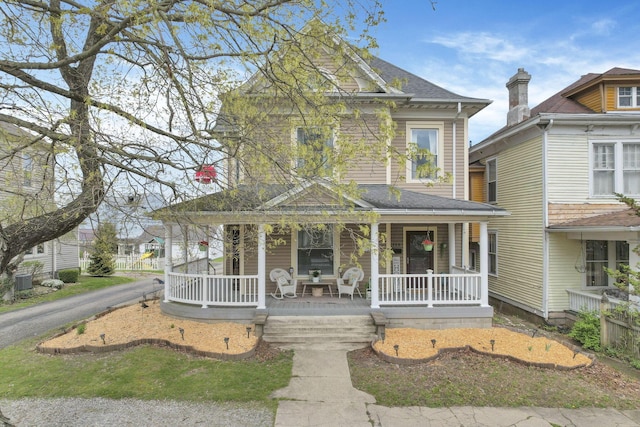 328 Pearl St, Jackson, OH 45640 - view of front facade with a porch and roof with shingles