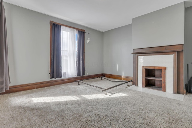 328 Pearl St, Jackson, OH 45640 - unfurnished living room with a fireplace, baseboards, and carpet floors
