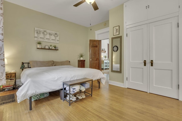 328 Pearl St, Jackson, OH 45640 - bedroom with light wood-type flooring, baseboards, a closet, and ceiling fan