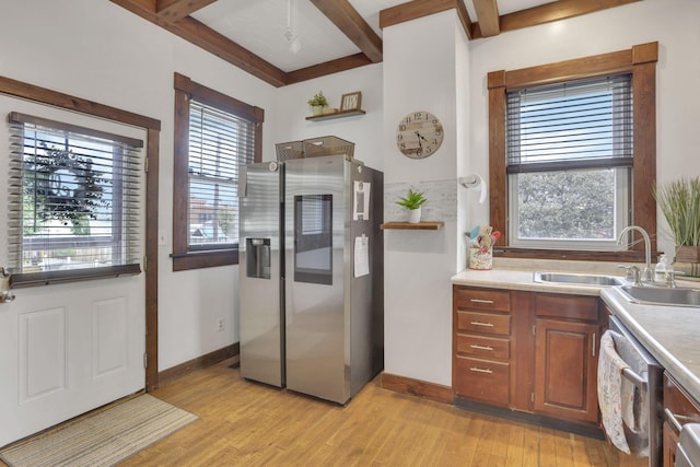 328 Pearl St, Jackson, OH 45640 - kitchen with appliances with stainless steel finishes, a sink, beamed ceiling, and light wood-style floors
