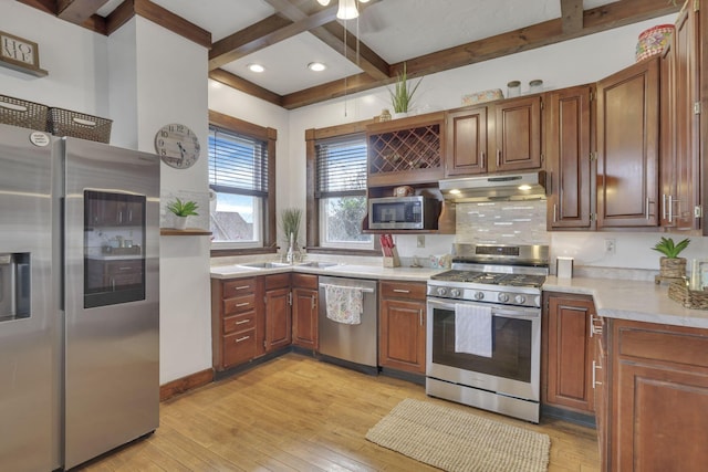 328 Pearl St, Jackson, OH 45640 - kitchen featuring tasteful backsplash, stainless steel appliances, beamed ceiling, light countertops, and under cabinet range hood