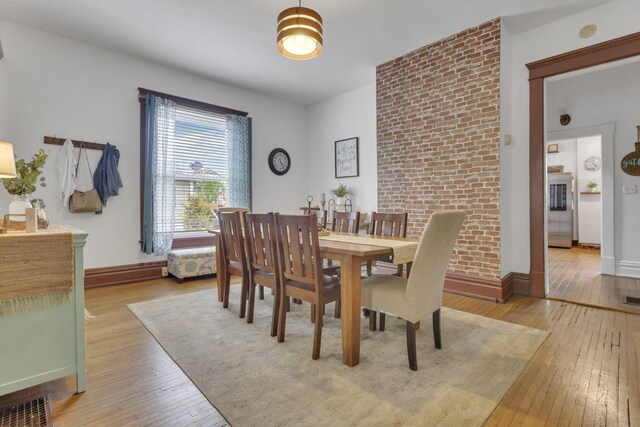 328 Pearl St, Jackson, OH 45640 - dining area with light wood-type flooring and baseboards