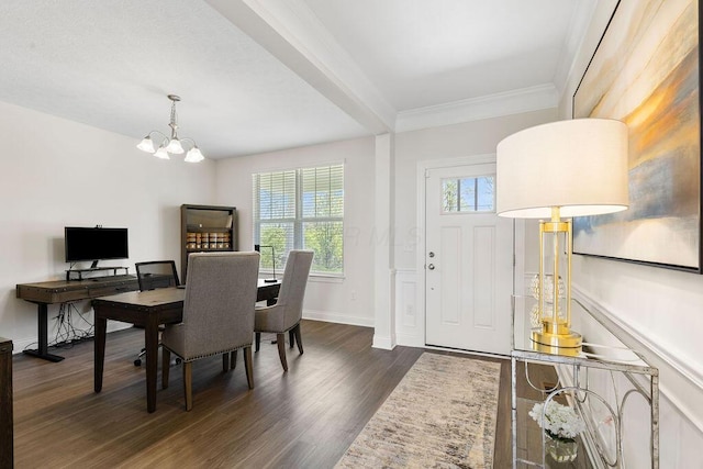 2418 Home Rd, Powell, OH 43065 - entrance foyer with dark wood-type flooring, crown molding, baseboards, and a notable chandelier