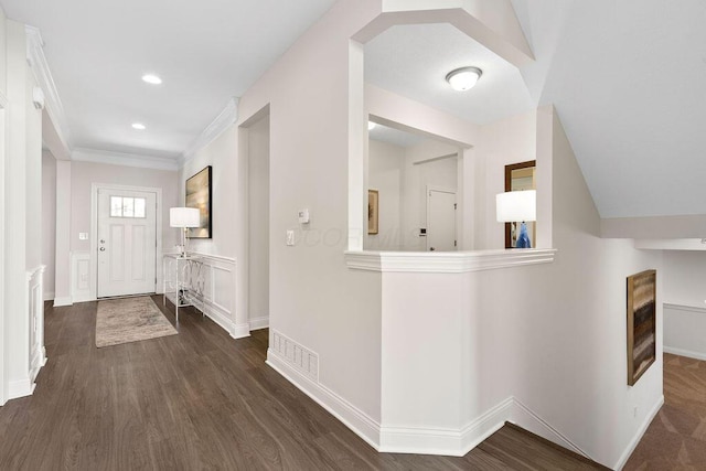 2418 Home Rd, Powell, OH 43065 - foyer entrance with dark wood-style flooring, baseboards, ornamental molding, visible vents, and recessed lighting