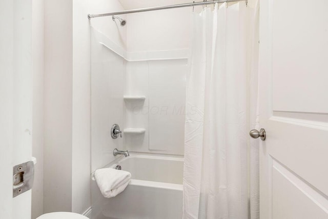 2418 Home Rd, Powell, OH 43065 - bathroom with shower / tub combo with curtain