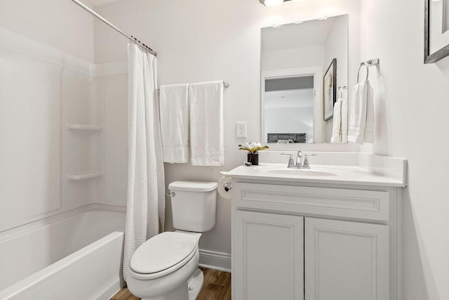 2418 Home Rd, Powell, OH 43065 - bathroom featuring wood finished floors, vanity, shower / bath combination with curtain, baseboards, and toilet