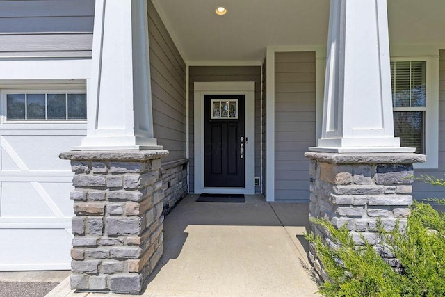 2418 Home Rd, Powell, OH 43065 - doorway to property featuring covered porch