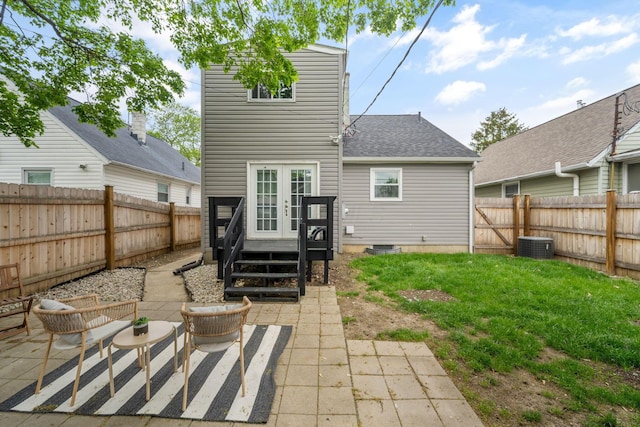 876 Palmer Rd, Columbus, OH 43212 - back of property featuring french doors, a patio, a fenced backyard, and roof with shingles