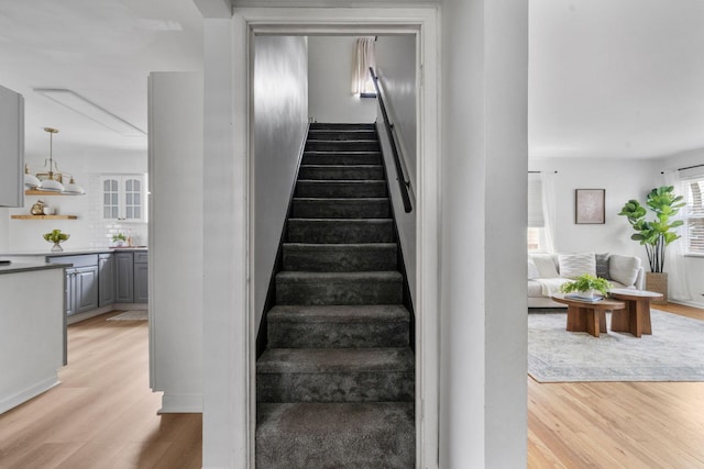 876 Palmer Rd, Columbus, OH 43212 - staircase featuring wood finished floors