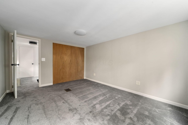 876 Palmer Rd, Columbus, OH 43212 - unfurnished bedroom featuring carpet floors, baseboards, and visible vents