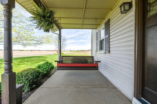 view of patio featuring a porch