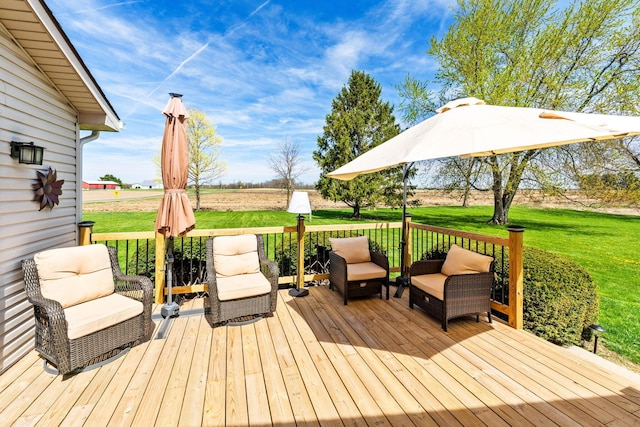 wooden deck with a lawn