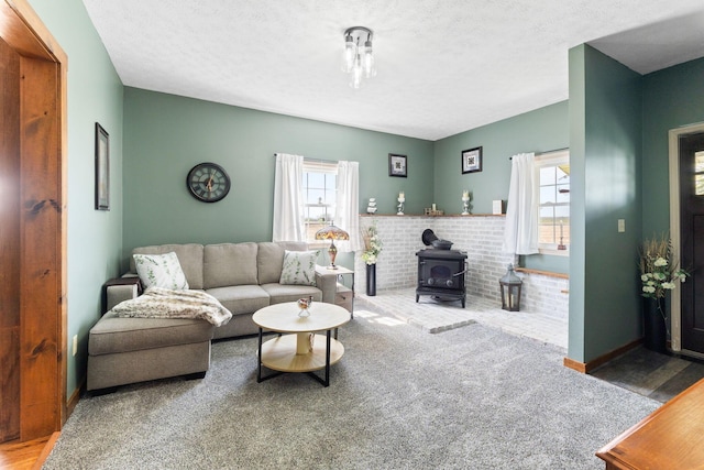 living room featuring a wood stove