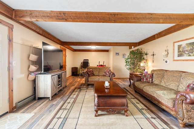 living area with light wood-type flooring, beam ceiling, and a baseboard heating unit