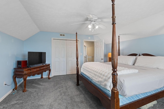 bedroom featuring vaulted ceiling, visible vents, a closet, and carpet flooring
