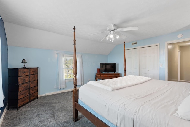 carpeted bedroom with vaulted ceiling, visible vents, a ceiling fan, a closet, and baseboards