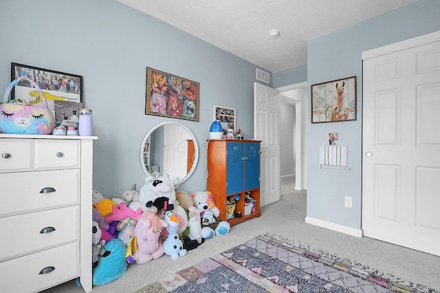 game room featuring baseboards, carpet flooring, and visible vents