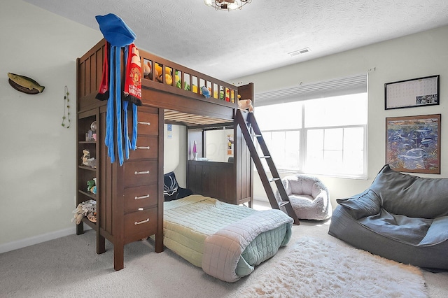 bedroom featuring carpet, visible vents, and baseboards
