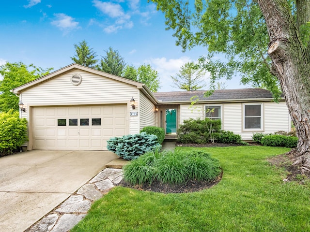 3794 Bridle Ct, Columbus, OH 43221 - ranch-style house featuring concrete driveway, an attached garage, and a front yard