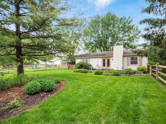 3794 Bridle Ct, Columbus, OH 43221 - view of yard featuring french doors and central AC