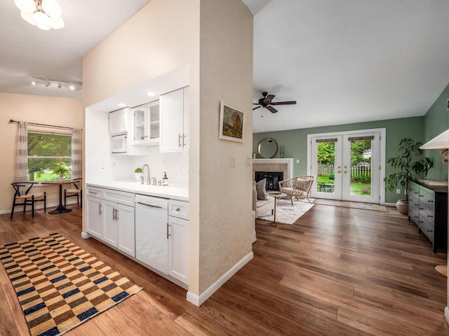 3794 Bridle Ct, Columbus, OH 43221 - kitchen with white dishwasher, healthy amount of natural light, open floor plan, and ceiling fan