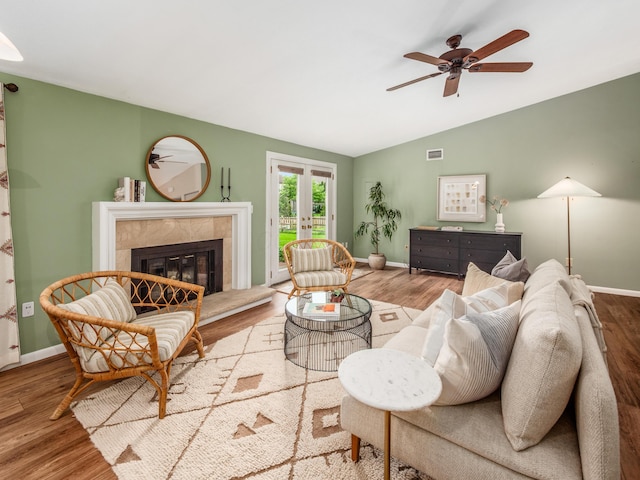 3794 Bridle Ct, Columbus, OH 43221 - living room with vaulted ceiling, wood finished floors, ceiling fan, french doors, and baseboards