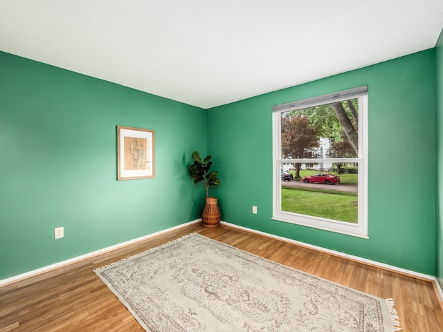 3794 Bridle Ct, Columbus, OH 43221 - unfurnished room featuring baseboards and wood finished floors