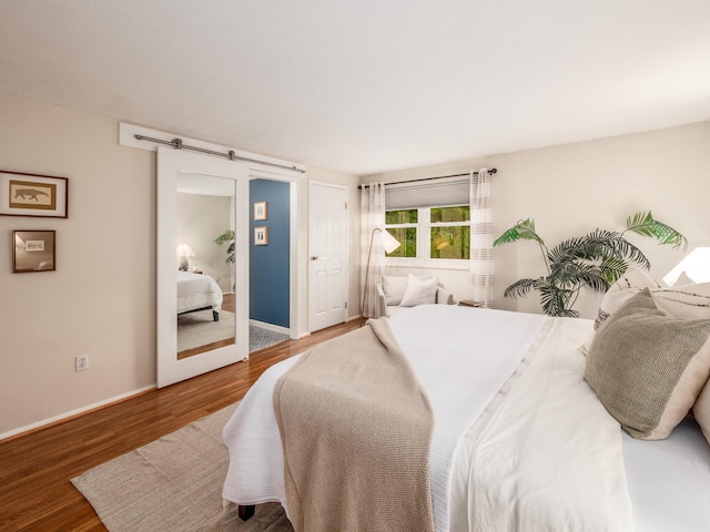 3794 Bridle Ct, Columbus, OH 43221 - bedroom with wood finished floors and baseboards