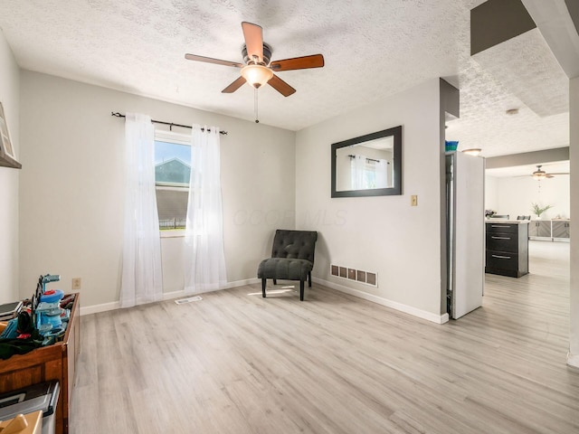 5407 Davidson Rd, Hilliard, OH 43026 - living area with ceiling fan, light wood finished floors, and visible vents