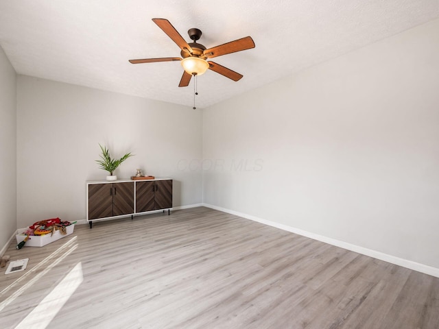 5407 Davidson Rd, Hilliard, OH 43026 - unfurnished room featuring baseboards, ceiling fan, light wood finished floors, and visible vents