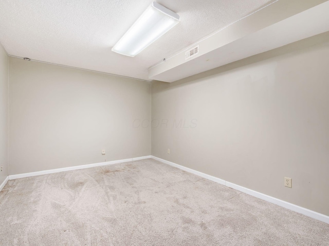 5407 Davidson Rd, Hilliard, OH 43026 - unfurnished room featuring a textured ceiling, baseboards, visible vents, and carpet