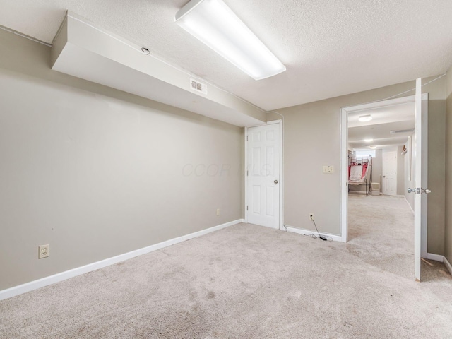 5407 Davidson Rd, Hilliard, OH 43026 - carpeted spare room with a textured ceiling, visible vents, and baseboards
