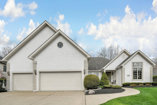 12372 Brook Forest Cir NW, Pickerington, OH 43147 - ranch-style home with an attached garage, concrete driveway, stucco siding, and a front lawn