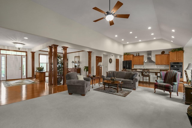 12372 Brook Forest Cir NW, Pickerington, OH 43147 - living area featuring ceiling fan, decorative columns, recessed lighting, vaulted ceiling, and light carpet