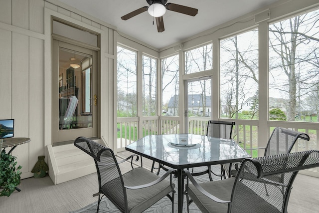 12372 Brook Forest Cir NW, Pickerington, OH 43147 - sunroom / solarium with outdoor dining area and ceiling fan