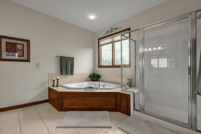 12372 Brook Forest Cir NW, Pickerington, OH 43147 - full bathroom featuring baseboards, vaulted ceiling, a stall shower, tile patterned flooring, and a bath
