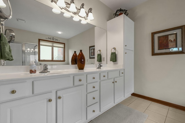 12372 Brook Forest Cir NW, Pickerington, OH 43147 - full bath with visible vents, a sink, tile patterned flooring, double vanity, and a stall shower