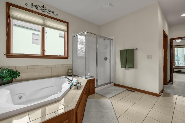 12372 Brook Forest Cir NW, Pickerington, OH 43147 - bathroom with a shower stall, a jetted tub, tile patterned flooring, and visible vents