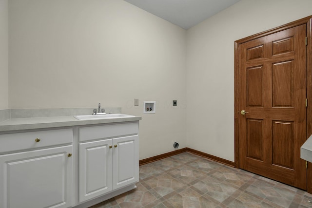 12372 Brook Forest Cir NW, Pickerington, OH 43147 - clothes washing area with baseboards, washer hookup, a sink, hookup for an electric dryer, and cabinet space