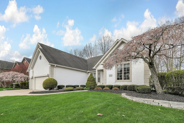 12372 Brook Forest Cir NW, Pickerington, OH 43147 - single story home with concrete driveway, stucco siding, and a front yard